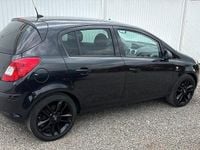 Używany Opel Corsa Active 87 KM (63 kW) 2013 Czarny Hatchback