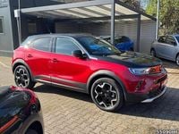 Gebraucht Opel Mokka-e Ultimate 100 kW (136 PS) 2021 Power rot/kosmos rot SUV