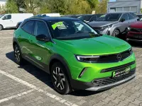Gebraucht Opel Mokka Elegance 136 PS (100 kW) 2023 Lackierung matcha green/typ au SUV