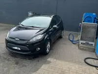Gebraucht Ford Fiesta 71 PS (52 kW) 2012 Schwarz Kleinwagen