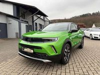 Gebraucht Opel Mokka Elegance 110 PS (80 kW) 2021 Matcha green/ikone gruen SUV