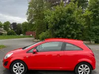 Gebraucht Opel Corsa Active 69 PS (50 kW) 2013 Rot Kleinwagen