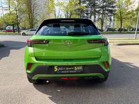 Gebraucht Opel Mokka Elegance 131 PS (96 kW) 2024 Lackierung matcha green/typ au SUV