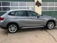 Second-hand BMW X1 204 CP (150 kW) 2012 Argintiu SUV