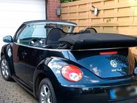 Gebraucht VW New Beetle 102 PS (75 kW) 2010 Schwarz Kleinwagen