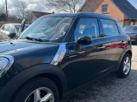 Gebraucht Mini Cooper D 111 PS (81 kW) 2010 Schwarz Kleinwagen