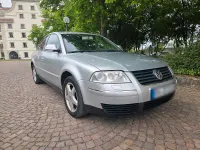 Second-hand VW Passat 180 CP (132 kW) 2004 Argintiu Berlinǎ