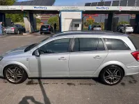 Używany Opel Astra 110 KM (80 kW) 2011 Srebrny Kombi