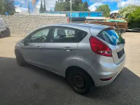 Second-hand Ford Fiesta Trend 82 CP (60 kW) 2010 Argintiu Berlinǎ
