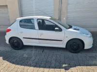 Gebraucht Peugeot 206 73 PS (53 kW) 2011 Weiß Limousine