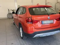 Second-hand BMW X1 143 CP (105 kW) 2013 Portocaliu SUV