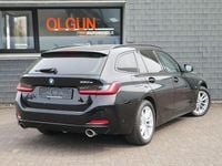 Gebraucht BMW 320 Performance 163 PS (119 kW) 2023 Schwarz ii/bonnet fluid black Kombi