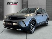 Gebraucht Opel Mokka-e Elegance 100 kW (136 PS) 2023 Kontrast grau/quarz silber SUV