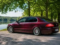 Używany Skoda Superb 160 KM (117 kW) 2009 Czerwony Sedan/Limuzyna