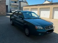 Gebraucht Suzuki Baleno 85 PS (62 kW) 2001 Grün Limousine
