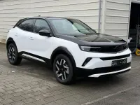 Neu Opel Mokka 145 PS (106 kW) 2025 Kontrast grau metallic / schwarzes dach SUV