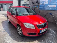 Używany Skoda Fabia 69 KM (50 kW) 2011 Czerwony Kombi