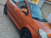 Gebraucht Kia Picanto Attract 65 PS (47 kW) 2009 Orange Kleinwagen