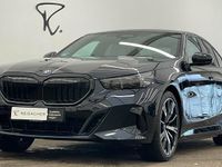 Gebraucht BMW 550e Comfort Edition 490 PS (360 kW) 2025 Carbonschwarz metallic Limousine