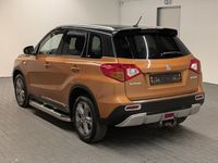 Gebraucht Suzuki Vitara 120 PS (88 kW) 2017 Orange (orangemet.) SUV