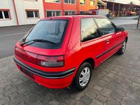 Gebraucht Mazda 323 84 PS (61 kW) 1991 Rot Limousine