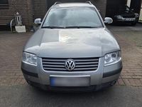 Second-hand VW Passat 100 CP (73 kW) 2004 Gri Break
