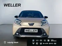 Gebraucht Toyota Aygo 72 PS (52 kW) 2022 Ginger beige metallic / dach mysticschwarz mica Kleinwagen