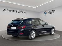 Gebraucht BMW 330e 184 PS (135 kW) 2023 Saphirschwarz Kombi