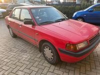 Gebraucht Mazda 323 88 PS (64 kW) 1991 Rot Limousine