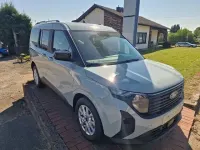 Neu Ford Tourneo Courier Titanium 125 PS (91 kW) 2025 Grau Van / Kleinbus