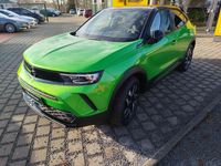 Gebraucht Opel Mokka 131 PS (96 kW) 2024 Lackierung matcha green/typ aussenverkleidung metalliclackierung SUV