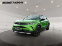 Gebraucht Opel Mokka-e Elegance 100 kW (136 PS) 2022 Matcha green/ikone gruen SUV