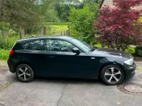 Gebraucht BMW 116 116 PS (85 kW) 2010 Schwarz Kleinwagen