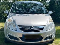 Używany Opel Corsa 80 KM (58 kW) 2009 Srebrny Hatchback