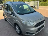 Gebraucht Ford Tourneo Courier Trend 101 PS (74 kW) 2014 Silber Van / Kleinbus