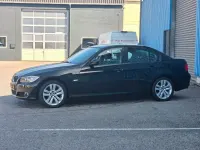 Second-hand BMW 318 143 CP (105 kW) 2011 Negru Berlinǎ