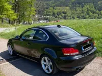 Second-hand BMW 123 Performance 204 CP (150 kW) 2009 Negru Hatchback