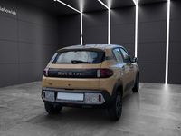 Gebraucht Dacia Spring Extreme 47 kW (65 PS) 2024 Safaribeige Kleinwagen