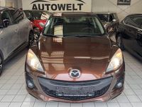 Używany Mazda 3 Edition 105 KM (77 kW) 2012 Brązowy Sedan/Limuzyna
