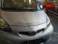 Gebraucht Toyota Aygo 68 PS (50 kW) 2010 Silber Kleinwagen