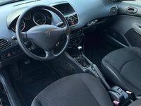 Gebraucht Peugeot 206+ 68 PS (50 kW) 2011 Schwarz Kleinwagen
