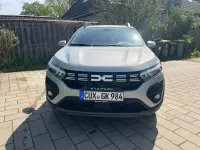 Używany Dacia Sandero Expression 91 KM (66 kW) 2023 Szary Sedan/Limuzyna