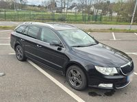 Używany Skoda Superb Elegance 140 KM (102 kW) 2012 Czarny Kombi