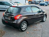 Gebraucht Peugeot 208 68 PS (50 kW) 2012 Braun Kleinwagen