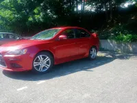 Gebraucht Mitsubishi Lancer 130 PS (95 kW) 2015 Rot Limousine
