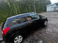 Używany Opel Corsa 75 KM (55 kW) 2010 Czarny Hatchback