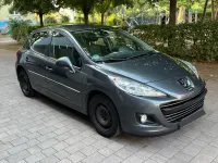 Gebraucht Peugeot 207 95 PS (69 kW) 2011 Grau Limousine