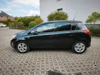 Gebraucht Opel Corsa Active 95 PS (69 kW) 2013 Schwarz Kleinwagen