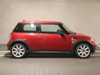Gebraucht Mini Cooper D Seven 88 PS (64 kW) 2006 Solar red metallic Kleinwagen