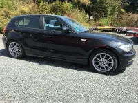 Second-hand BMW 116 122 CP (89 kW) 2009 Negru Hatchback